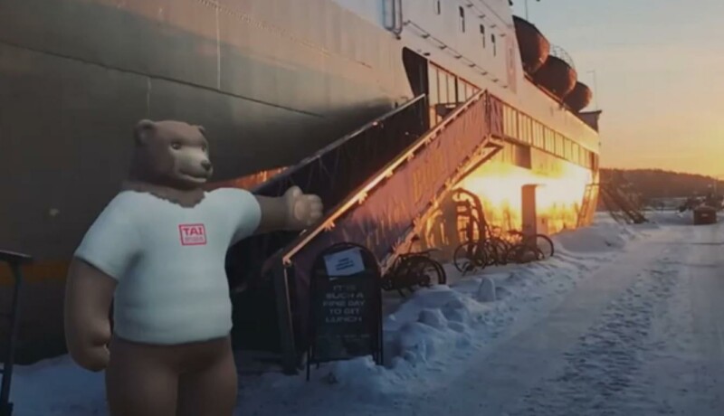 Animerad björn står vid fartyg