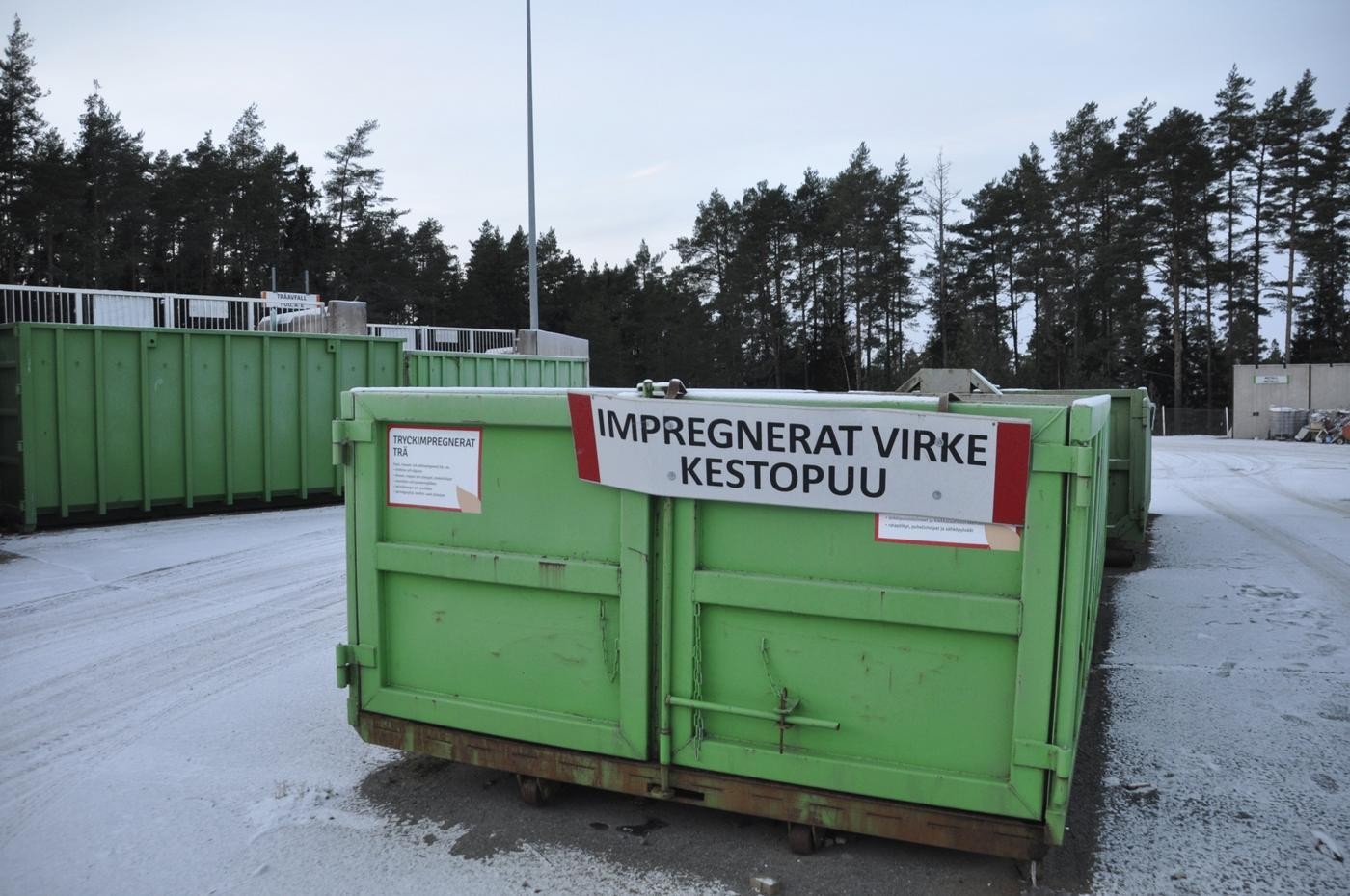 container för impregnerat virke