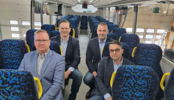 Fyra män i en buss