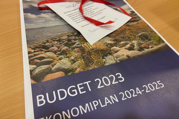 ett häfte med en hälsning