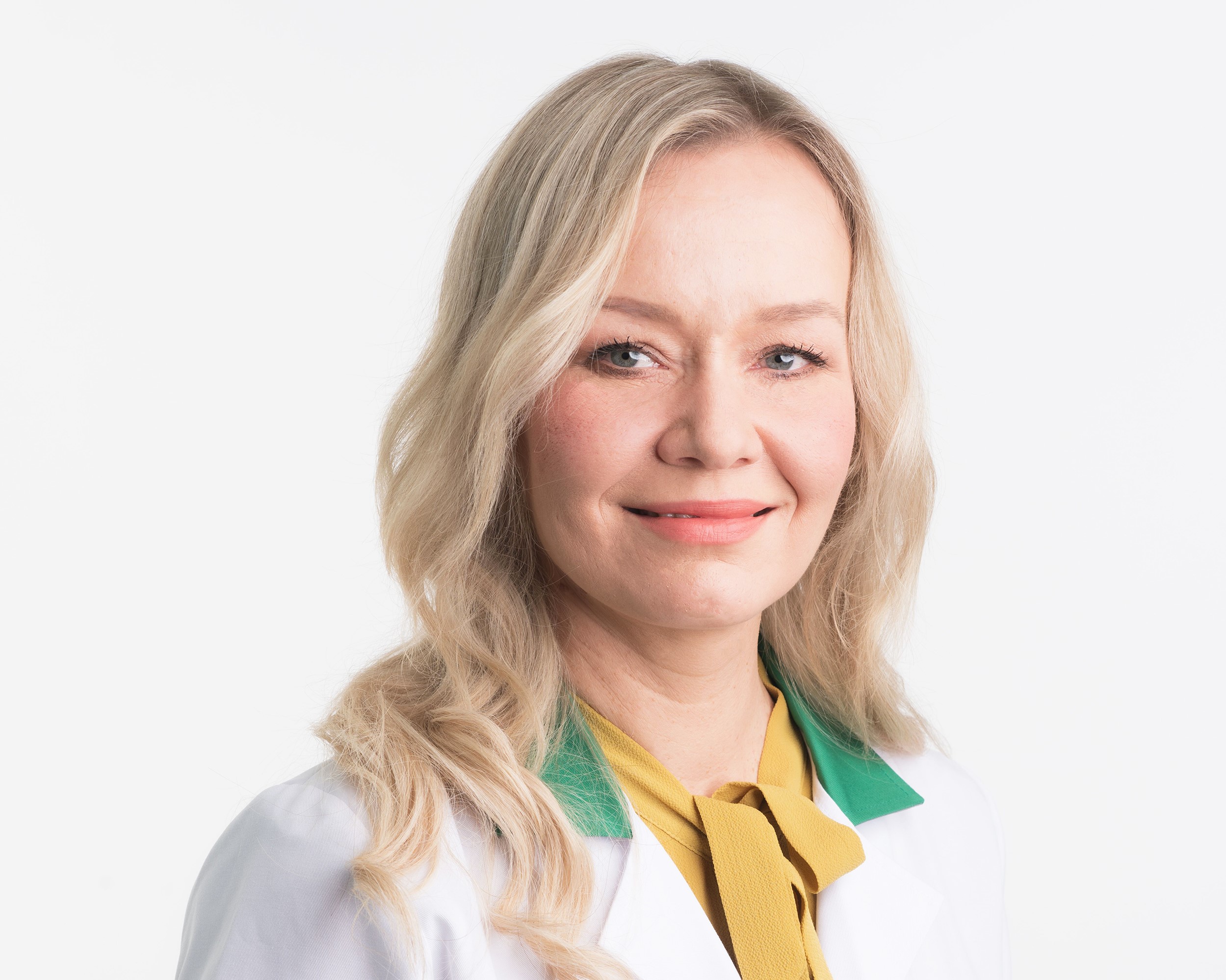 Taru Vanhala i apoteksuniform.