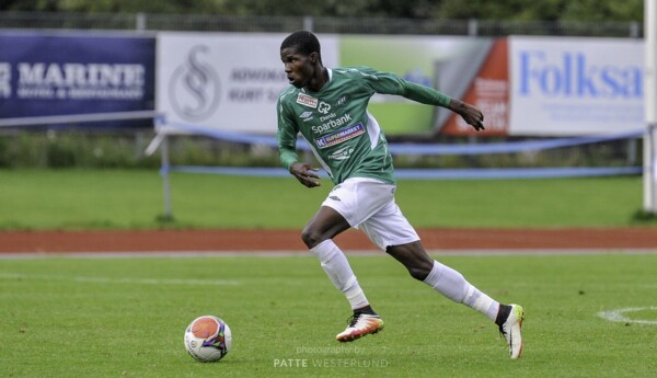 Fotbollsspelare med bollen.